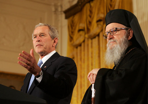 President George W. Bush is joined by Archbishop Demetrios as he delivers his remarks at the Celebration of Greek Independence Day Tuesday, March 25, 2008, in the East Room of the White House. White House photo by Joyce N. Boghosian