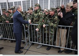 President George W. Bush greets U.S. military personnel on his arrival to Wright-Patterson Air Force Base Thursday, March 27, 2008, in Ohio. White House photo by Eric Draper