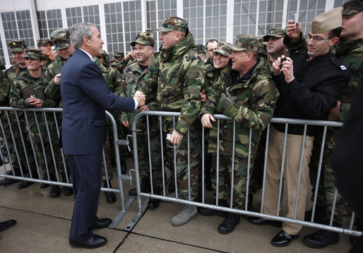 President George W. Bush greets U.S. military personnel on his arrival to Wright-Patterson Air Force Base Thursday, March 27, 2008, in Ohio. White House photo by Eric Draper