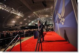 President George W. Bush waves to applauding audience members following his address on the Global War on Terror Thursday, March 27, 2008, at the National Museum of the United States Air Force in Dayton, Ohio. White House photo by Eric Draper