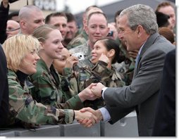 President George W. Bush shakes hands with troops following his event in Freehold, New Jersey Friday, March 28, 2008, at McGuire Air Force Base in New Jersey. White House photo by Chris Greenberg