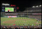 President George W. Bush throws the ceremonial first pitch before a sold out crowd at the Washington Nationals season opener, as they host the Atlanta Braves Sunday, March 30, 2008, at their new home field at Nationals Park in Washington, D.C. White House photo by Chris Greenberg