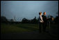 President George W. Bush, accompanied by Mrs. Laura Bush, talks to reporters before their departure to Ukraine Monday, March 31, 2008, on the South Lawn of the White House. President Bush urges Congress to pass the FISA reform bill and to act quickly to approve the Colombian Free Trade Agreement. President and Mrs. Laura Bush depart on a six-day trip to Ukraine, Romania, Croatia, and Russia. President Bush will have a scheduled meeting with Russian President Vladimir Putin. White House photo by David Bohrer