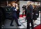 President George W. Bush reaches out for the hand of President Stjepan Mesic of Croatia upon arrival at the official welcoming ceremonies Friday, April 4, 2008, at the Office of the President in Zagreb. White House photo by Eric Draper