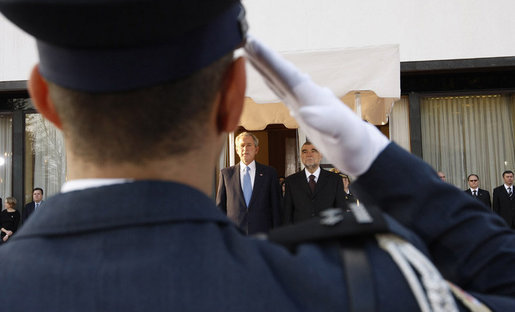 President George W. Bush and President Stjepan Mesic of Croatia stand for their respective national anthems Friday, April 4, 2008, during welcoming ceremonies in Zagreb for the President and Mrs. Bush. White House photo by Eric Draper