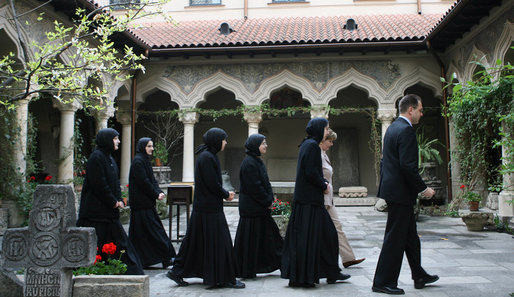 Mrs. Laura Bush and Sisters of the Stavropoleos Monastery in Bucharest, follow Dr. Petre Radu Guran as he leads them across the church courtyard Friday, April 4, 2008. In 2003, the U.S. Embassy donated $27,000 for the restoration of the courtyard under the auspices of a special U.S. Department of State program entitled, “Ambassador’s Fund for Cultural Preservation. White House photo by Shealah Craighead