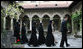 Mrs. Laura Bush and Sisters of the Stavropoleos Monastery in Bucharest, follow Dr. Petre Radu Guran as he leads them across the church courtyard Friday, April 4, 2008. In 2003, the U.S. Embassy donated $27,000 for the restoration of the courtyard under the auspices of a special U.S. Department of State program entitled, “Ambassador’s Fund for Cultural Preservation. White House photo by Shealah Craighead