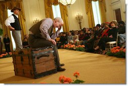 Mrs Laura Bush and Salma Kikwete, First Lady of Tanzania, watch a performance from Ford's Theatre's new production, One Destiny, Monday, April 7, 2008, in the East Room of the White House. White House photo by Shealah Craighead