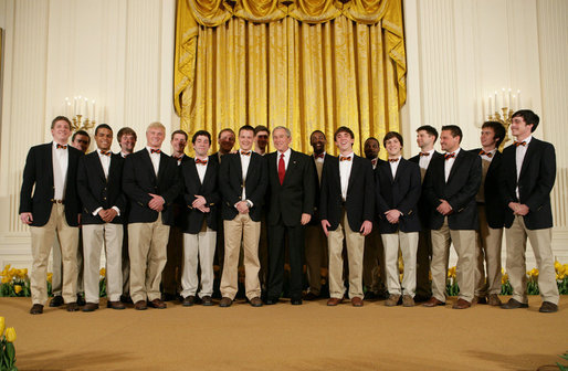 President George W. Bush thanks the Virginia Gentlemen, an a cappella vocal ensemble of the University of Virginia, following their performance Monday evening, April 14, 2008 in the East Room of the White House, during a reception in honor of the 265th birthday of former President Thomas Jefferson. White House photo by Chris Greenberg