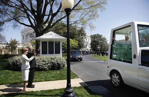 President George W. Bush and Laura Bush wave goodbye to Pope Benedict XVI as he prepares to leave the White House Wednesday, April 16, 2008 in the Pope mobile, following his official welcome to the White House. White House photo by Eric Draper