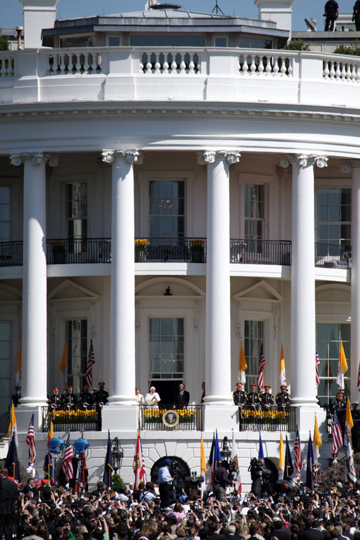 President George W. Bush and Mrs. Laura Bush stand with Pope Benedict XVI as he acknowledges the cheers from the crowd from the South Portico balcony Wednesday, April 16, 2008, on the South Lawn of the White House. White House photo by Grant Miller