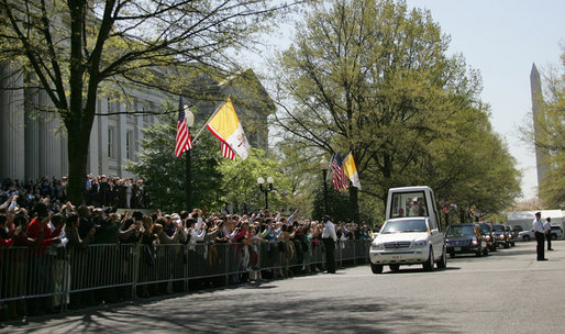 Crowds of people gather outside of the United States Treasury Department to see Pope Benedict XVI as he leaves the White House Wednesday, April 16, 2008, following the arrival ceremony on the South Lawn. White House photo by Patrick Tierney