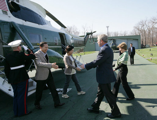 President George W. Bush and Laura Bush welcome South Korean President Lee Myung-bak and his wife, Kim Yoon-ok, Friday, April 18, 2008, to the Presidential retreat at Camp David, Md. White House photo by Joyce N. Boghosian