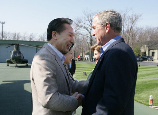 President George W. Bush and Laura Bush welcome South Korean President Lee Myung-bak and his wife, Kim Yoon-ok, Friday, April 18, 2008, to the Presidential retreat at Camp David, Md. White House photo by Joyce N. Boghosian