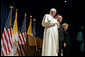 Pope Benedict XVI is joined by Vice President Dick Cheney and Mrs. Lynne Cheney for a farewell ceremony in honor of the Pope, Sunday, April 20, 2008 at John F. Kennedy International Airport in New York. During the ceremony the Vice President said, "Your presence has honored our country. Although you must leave us now, your words and the memory of this week will stay with us. For that, we are truly and humbly grateful." White House photo by David Bohrer