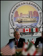 President George W. Bush addresses a meeting of the North American Competitiveness Council Tuesday, April 22, 2008 in New Orleans, attended by Mexico's President Felipe Calderon and Canada's Prime Minster Stephen Harper, along with international business leaders at the 2008 North American Leaders' Summit. White House photo by Joyce N. Boghosian