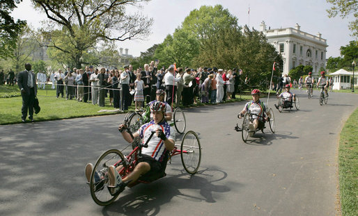 Members of the Wounded Warrior Project's Soldier Ride ride along the South Lawn drive at the White House Thursday, April 24, 2008, during the kick off of the annual "Soldier Ride: White House to Lighthouse Challenge" bike ride. White House photo by Joyce N. Boghosian