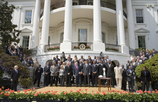 President George W. Bush and Vice President Dick Cheney pose for a photo with the Super Bowl XLII Champion New York Giants, Wednesday, April 30, 2008, on the South Lawn of the White House. White House photo by David Bohrer