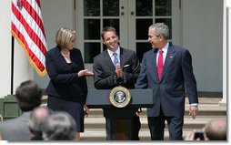 Mike Geisen, the 2008 National Teacher of the Year, is flanked by President George W. Bush and Secretary of Education Margaret Spellings as they welcome him to the Rose Garden Wednesday, April 30, 2008. The 35-year-old, 7th-grade teacher from Crook County Middle School in Prineville, Ore., was chosen from 56 nominees, including the four U.S. territories, the District of Columbia and the Department of Defense Education Activity. White House photo by Shealah Craighead