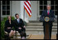 Secretary of Education Margaret Spellings and Mike Geisen, the 2008 National Teacher of the Year, break out in laughter as President George W. Bush delivers remarks during ceremonies in the Rose Garden Wednesday, April 30, 2008, honoring the country's top educators. White House photo by Shealah Craighead