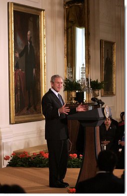 President George W. Bush delivers remarks during the Celebration of Asian Pacific American Heritage Month Thursday, May 1, 2008, in the East Room of the White House. "More than 15 million Americans claim Asian or Pacific ancestry. They make America's culture more vibrant, and we're a better place and a more lively place," President Bush stated during his remarks. White House photo by Grant Miller