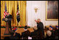 President George W. Bush salutes Tech Sgt. Ben Kuroki, of the 442nd Regiment, during his remarks Thursday, May 1, 2008, at the Celebration of Asian Pacific American Heritage Month in the East Room of the White House. Ben Kuroki, flew nearly 60 combat missions in both Europe and the Pacific. The 442nd Regimental Combat Team was a segregated Army unit composed mostly of Japanese American volunteers. They served with distinction in eight battle campaigns in Europe, and the 442nd was one of the most highly decorated units in World War II. White House photo by Joyce N. Boghosian