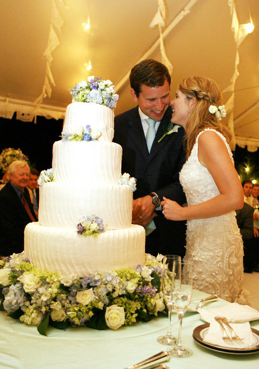 Henry and Jenna Hager pause as they cut their wedding cake Saturday, May 10, 2008, during a reception in their honor following the ceremony at Prairie Chapel Ranch near Crawford, Texas. White House photo by Shealah Craighead