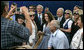 President George W. Bush and President Shimon Peres of Israel are surrounded by members of the media as they pose for photographs during their meeting Wednesday, May 14, 2008, at President Peres’ Jerusalem residence. White House photo by Joyce N. Boghosian