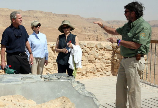 Director Eitan Campbell describes the water system of Masada to President George W. Bush, Mrs. Laura Bush and Mrs. Aliza Olmert, Thursday, May 15, 2008, as they tour the historic fortress built by King Herod of Judea, who ruled from 37 BC to 4 BC and chose the site as a refuge against his enemies and as a winter palace. White House photo by Joyce N. Boghosian