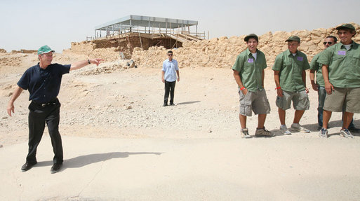 President George W. Bush waves goodbye to a group of young American men who are volunteering their time at Masada National Park in Masada, Israel. White House photo by Joyce N. Boghosian