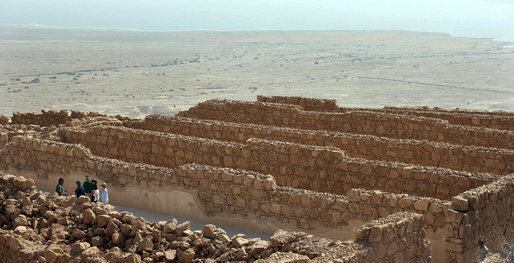 President George W. Bush and Mrs. Laura Bush and Israel’s Prime Minister Ehud Olmert and Mrs. Aliza Olmert tour the storerooms complex at Masada during their visit Thursday, May 15, 2008, in Masada, Israel. The storerooms complex is a concentration of 29 long rooms surrounded by corridors that was built by King Herod of Judea to hold food, liquids and weapons in the palatial fortress. White House photo by Shealah Craighead