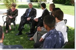 President George W. Bush and Mrs. Laura Bush participate in a roundtable discussion with a group of youths at the Bible Lands Museum Jerusalem Friday, May 16, 2008. Young leaders interested in fostering peace in their country, the youths represented cross cultures, including Jews, Israel Arabs, Palestinians and an immigrant from Ethiopia.  White House photo by Joyce N. Boghosian