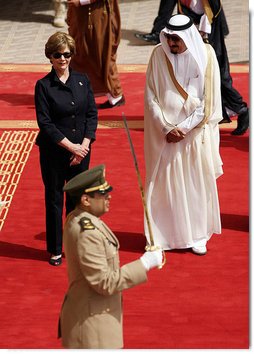 Mrs. Laura Bush and President Bush are greeted by Saudi delegation members during arrival ceremonies Friday, May 16, 2008, at Riyadh-King Khaled International Airport in Riyadh. White House photo by Shealah Craighead