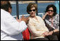 Mrs. Laura Bush and Mrs. Anita McBride, Assistant to the President and Chief of Staff to the First Lady, listen to Mr. Amir Ali, Hurghada Environmental Protection and Conservation Association, as they head out for a coral reefs and ocean conservation tour Saturday, May 17, 2008, in Sharm el Sheikh, Egypt. White House photo by Shealah Craighead