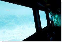 Mrs. Laura Bush looks out from underwater windows during her coral reefs and ocean conservation tour Saturday, May 17, 2008, in Sharm El Sheikh, Egypt. White House photo by Shealah Craighead