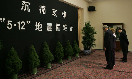 President George W. Bush and Mrs. Laura Bush stand with China's Ambassador to the United States Wenzhong Zhou and his spouse, Shumin Xie, during a moment of silence Tuesday, May 20, 2008, in honor of the victims of China's May 12 earthquake. Said the President afterward, "This natural disaster is very hard on many of your people and we understand that. And we extend our deepest sympathies, and pray for recovery and pray for the strength of those who are -- whose lives have been torn apart during this terrible tragedy." White House photo by Joyce N. Boghosian