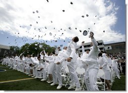 U.S. Coast Guard Academy graduates toss their hats into the air in celebration, Wednesday, May 21, 2008 during commencement ceremonies in New London, Conn. White House photo by David Bohrer