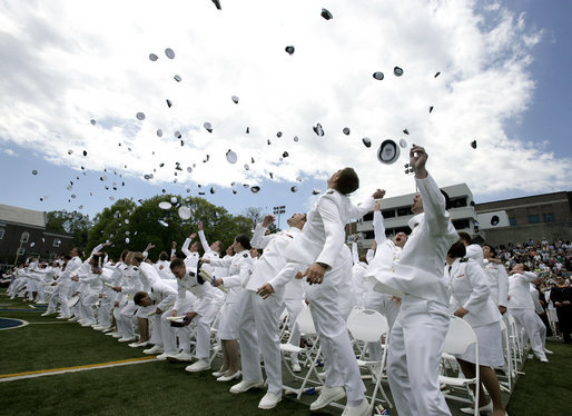 U.S. Coast Guard Academy graduates toss their hats into the air in celebration, Wednesday, May 21, 2008 during commencement ceremonies in New London, Conn. White House photo by David Bohrer