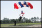 A member of U.S. Army's 82nd Airborne Division parachute team lands on the parade field during the President George W. Bush's visit Thursday, May 22, 2008 to Fort Bragg, N.C., on the occassion of the 82nd Airborne Division Review. White House photo by Chris Greenberg