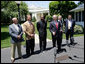 President George W. Bush speaks to reporters with NCAA head football coaches, from left to right, Jack Siedlecki of Yale University, Mark Richt of the University of Georgia, Randy Shannon of the University of Miami, Tommy Tuberville of Auburn University and Charlie Weis of the University of Notre Dame on Monday, May 26, 2008, at the White House. President Bush welcomed the coaches who were recently returning from visiting troops in the Middle East. White House photo by Chris Greenberg