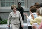 Mrs. Laura Bush is applauded following her address at a Smithsonian Institution luncheon Tuesday, May 27, 2008 in Washington, D.C., where Mrs. Bush was honored for her contributions to the arts in America. White House photo by Shealah Craighead