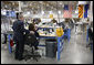 President George W. Bush visits with employees on the production floor of the Silverado Cable Company in Mesa, Arizona, Tuesday, May 27, 2008. White House photo by Eric Draper