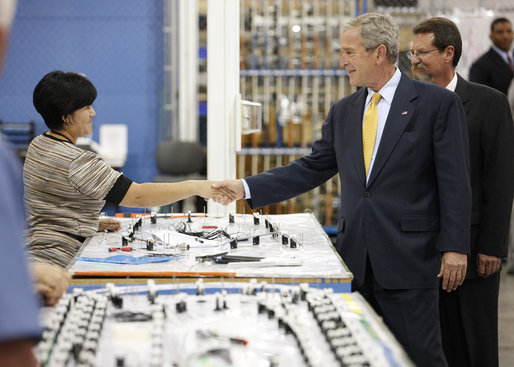 President George W. Bush greets an employee during his visit to Silverado Cable Company in Mesa, Arizona, Tuesday, May 27, 2008. White House photo by Eric Draper