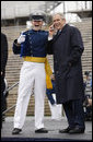 President George W. Bush shares a phone conversation with a graduate of the United States Air Force Academy Wednesday, May 28, 2008, after commencement ceremonies in Colorado Springs. The President told the class of 2008, "You're the 50th graduating class in the history of the Air Force Academy. Each of you has worked hard to reach this moment. I'll leave this campus today filled with the confidence in the course of our struggle and the fate of our country, because I've got confidence in each of you." White House photo by Eric Draper