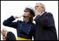 President George W. Bush shares in blowing a kiss to family and friends of a Class of 2008 graduate of the United States Air Force Academy Wednesday, May 28, 2008, during commencement ceremonies in Colorado Springs. Out of the 1, 012 cadets to graduate, 18 percent are women. White House photo by Eric Draper