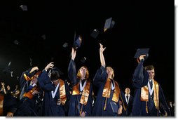 Graduates of Enterprise High School's Class of 2008 toss their caps into the air Thursday, May 29, 2008, during commencent exercises at the Alabama high school. Mrs. Laura Bush was on hand to deliver the commencement address to the class that lost four of its members in the 2007 tornadoes that devastated the city.  White House photo by Shealah Craighead