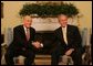 President George W. Bush and Prime Minister Ehud Olmert of Israel, shake hands during a photo opportunity prior to their meeting Wednesday, June 4, 2008, at the White House. White House photo by Joyce N. Boghosian