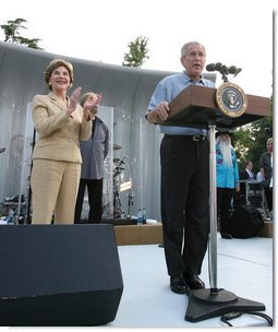 President George W. Bush and Laura Bush are seen on stage as they welcome guests to the annual Congressional Picnic on the South Lawn of the White House, Thursday evening, June 5, 2008, hosted for members of Congress and their families. White House photo by Shealah Craighead