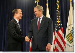 President George W. Bush congratulates Secretary of Housing and Urban Development Steve Preston, Friday, June 6, 2008, following the secretary's ceremonial swearing-in at the Department of Housing and Urban Development in Washington, D.C. White House photo by Joyce N. Boghosian