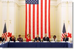 President George W. Bush delivers remarks during a drop-by meeting on the People's Republic of China Earthquake Relief Efforts Friday, June 6, 2008, at the American Red Cross National Headquarters. President Bush met with non-governmental organizations, faith-based groups, and business associations that have been involved in relief work in China in the wake of the recent earthquake.  White House photo by Joyce N. Boghosian